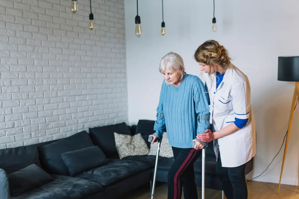 Woman walking towards a retirement home, smiling.