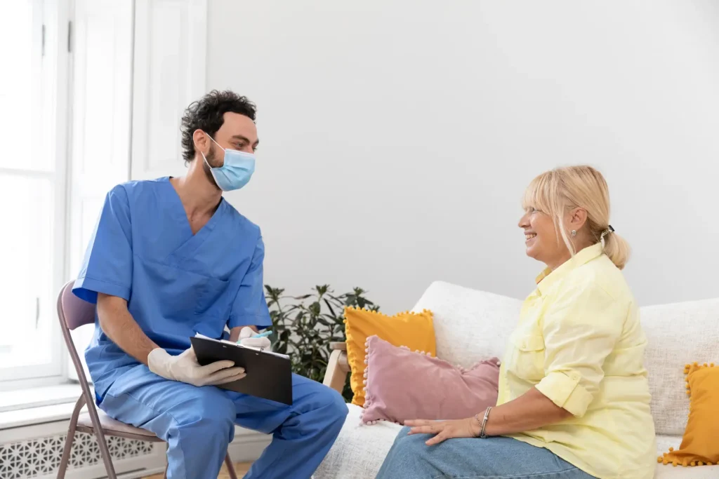 Patient discussing vaccine with doctor in close-up.