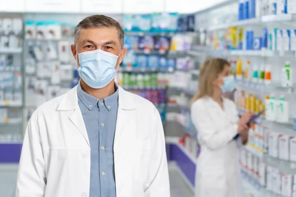 Pharmacists Wearing Face Masks in a Medium Shot